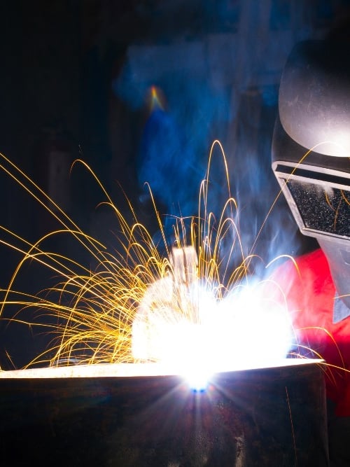 Kiwa certified welder welding metal